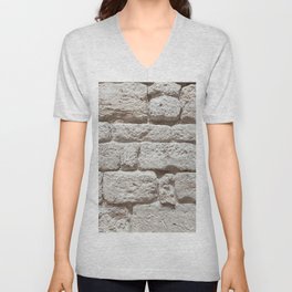 Texture of a stone wall. Old castle stone wall. Stone wall as a background or texture. Rock texture V Neck T Shirt