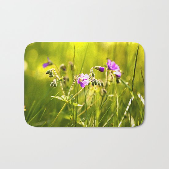 Beautiful meadow flowers - geranium on a sunny day - brilliant bright colors Bath Mat