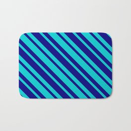 [ Thumbnail: Dark Turquoise & Blue Colored Lined Pattern Bath Mat ]
