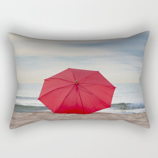 Red umbrella lying at the beach Rectangular Pillow