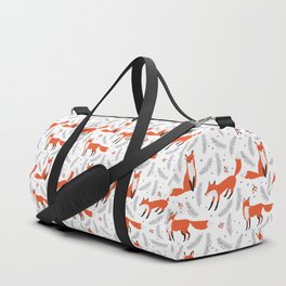 Red foxes and berries in the winter forest Duffle Bag
