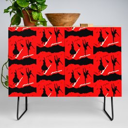 Two ballerina figures in black on red brush paper Credenza