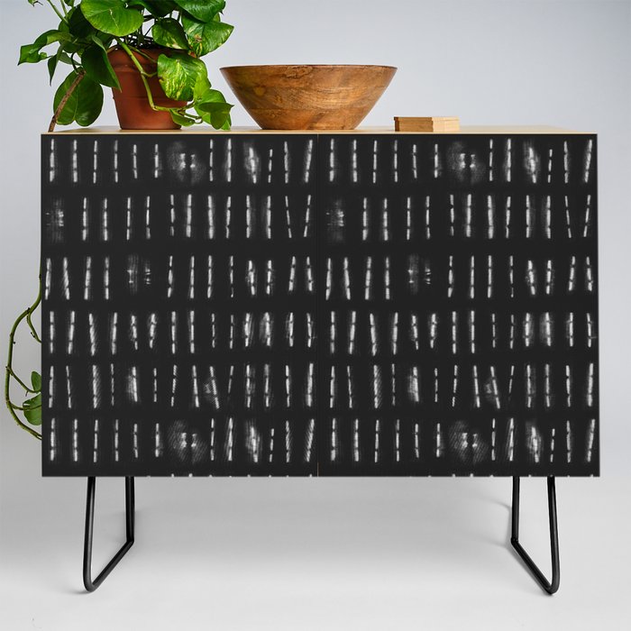 White vertical stripes over black background Credenza