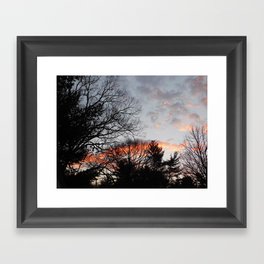 red clouds in the sky Framed Art Print