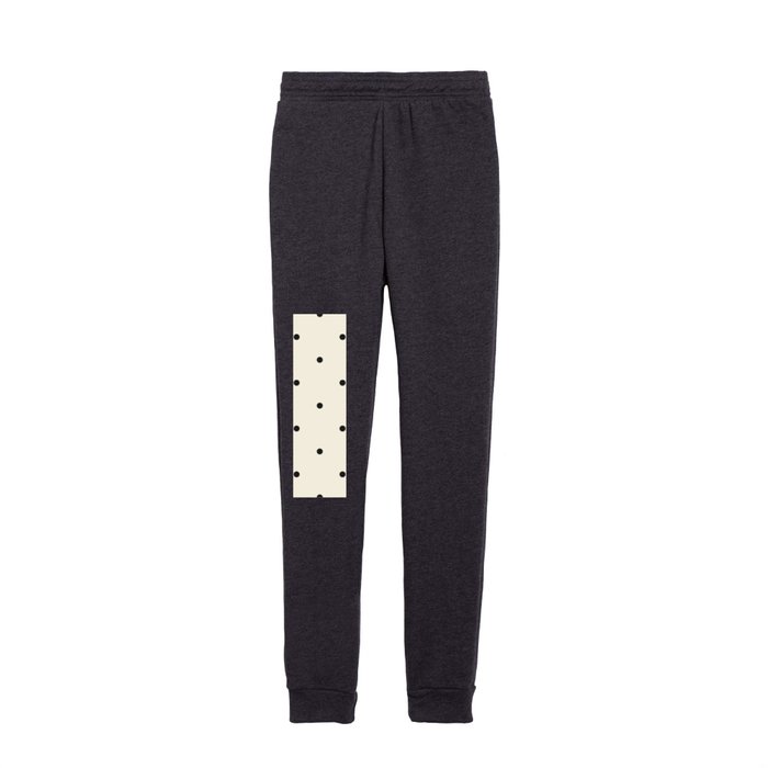 Black dots over cream background Kids Joggers