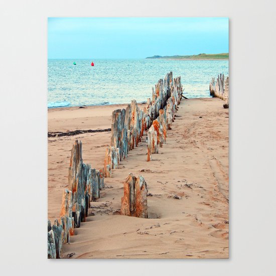 Wharf Remains on the Beach Canvas Print