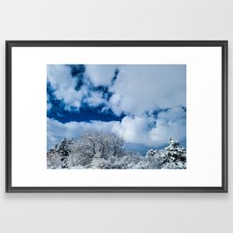 Clouds and Snow on a Winter Landscape Framed Art Print