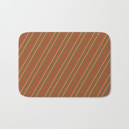 [ Thumbnail: Sienna, Light Coral & Forest Green Colored Stripes Pattern Bath Mat ]
