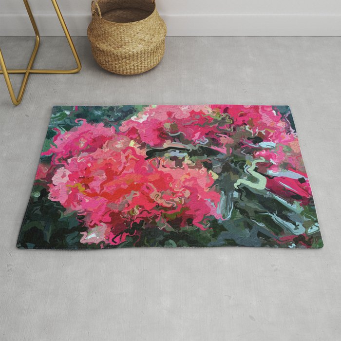 Red flower blossoms amid lush green foliage Rug