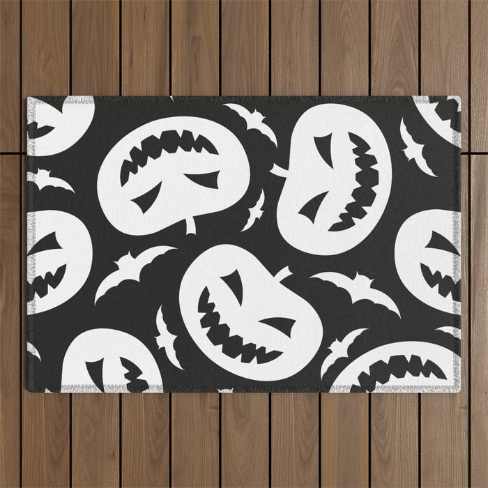 White halloween pumpkins and bats isolated on black background. Cute festive monochrome seamless pattern. Vintage flat graphic illustration. Texture.  Outdoor Rug
