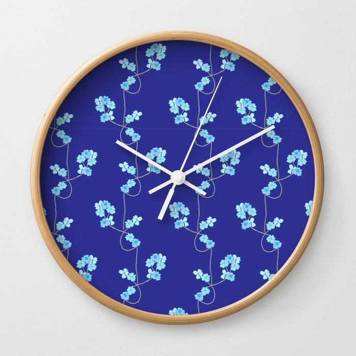 Light Blue Dogwood Flowers on a Branch w/Blue Background Wall Clock