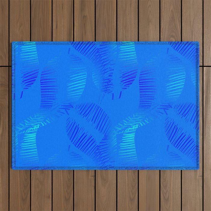 Pattern of neon feathers and leaves on a blue background. Outdoor Rug
