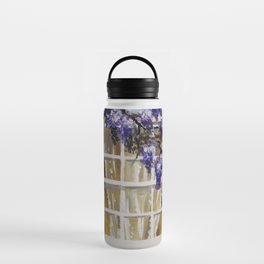 rustic country style white brick wall window purple wisteria flower Water Bottle