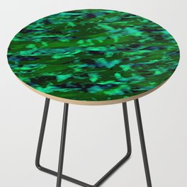 Abstract drawing of the movement of the sea wave in blue and green shades. The movement of fish among the algae. The effect of oil paints Side Table