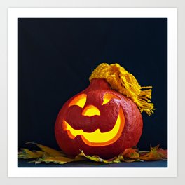Glowing Pumpkin with Autumn Leaves on a Dark Background. Jack's Lantern. Halloween Decoration Art Print