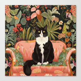 Tuxedo cat sitting in floral room Canvas Print