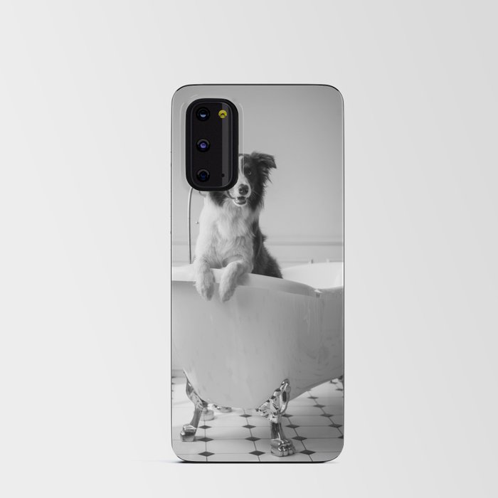 Border collie dog in a bear foot vintage bathtub black and white photograph - photography - photographs Android Card Case