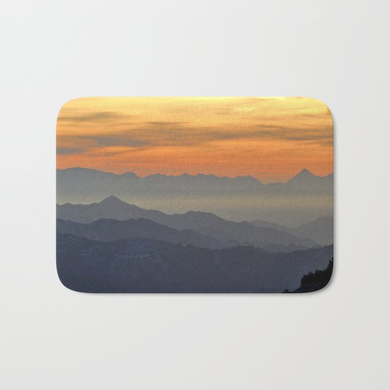 Mountains. Foggy sunset Bath Mat