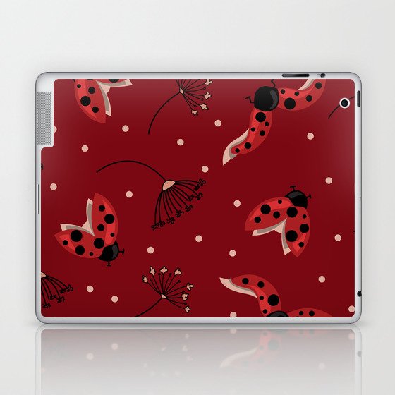 Seamless pattern with ladybugs and dried flowers on a burgundy background Laptop & iPad Skin