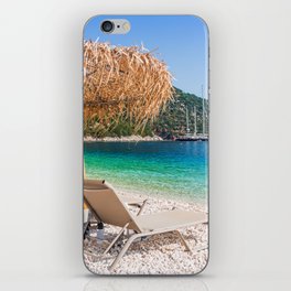 Kefalonia, Greece. Beach chair and umbrella at the Antisamos beach. iPhone Skin