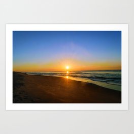 Sunrise over the beach Art Print