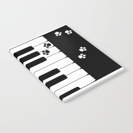 The keys of the piano . Creative black and white pattern . Notebook