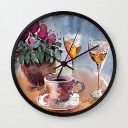 Romantic meeting. Round table of a street cafe with a cup of coffee, liqueur and flowers in a pot  Wall Clock