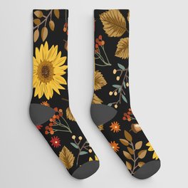Autumn sunflowers with black background pattern. Maple leaves, sunflowers, flowers ditsy.  Socks