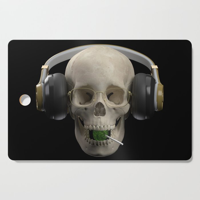The skull  in the headphones  Cutting Board