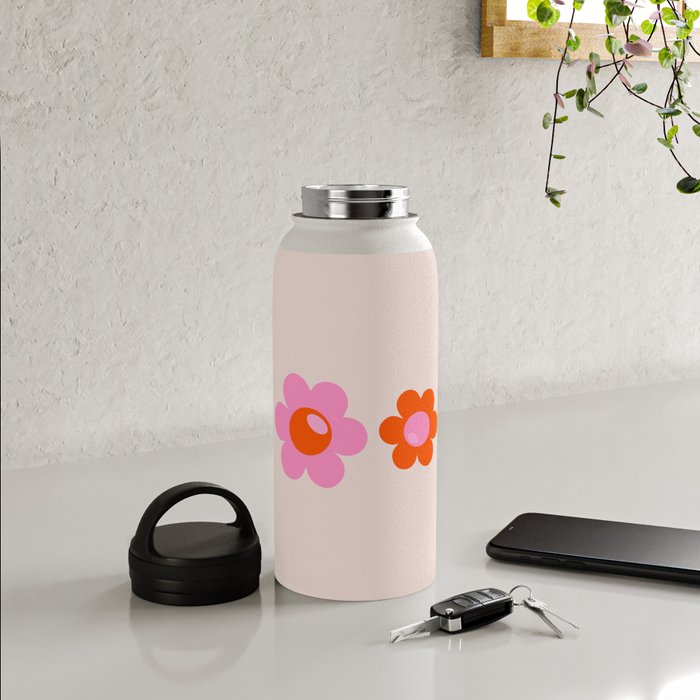 https://ctl.s6img.com/society6/img/Qvp6agSjcyj0fQcZ5YStXHxiCqw/w_700/water-bottles/32oz/handle-lid/lifestyle/~artwork,fw_3390,fh_2230,fy_-106,iw_3390,ih_2441/s6-original-art-uploads/society6/uploads/misc/d416b521d64a40788c13352235ad6f87/~~/les-fleurs-01-abstract-retro-floral-pink-and-orange-print-preppy-flowers-water-bottles.jpg