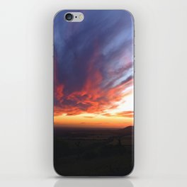 Dramatic red sunrise over the countryside hills, Aston Rowant Nature Reserve iPhone Skin