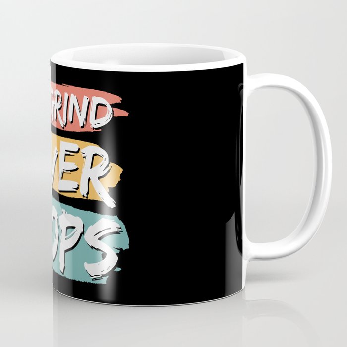 The Grind Never Stops Coffee Mug