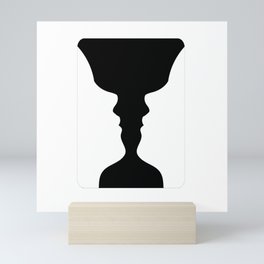 Two faces side by side- illusion of a vase also called Rubins vase Mini Art Print
