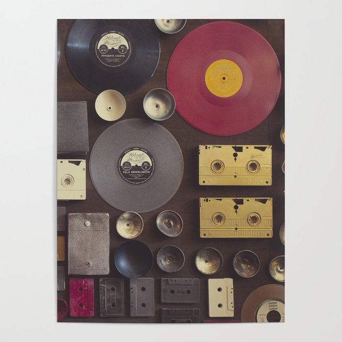 Music. Vintage wall with vinyl records and audio cassettes hung. Poster