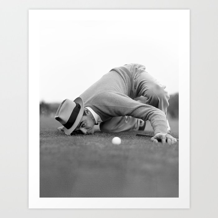 Eye to the ground on the 18th hole; golfing man eyes ball to measure distance to hole vintage black and white portrait photograph - photography - photographs poster Art Print
