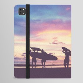 Silhouette Of surfer people carrying their surfboard on sunset beach, vintage filter effect with soft style iPad Folio Case