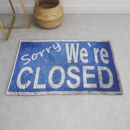 Vintage style Sorry We're Closed sign. Rug