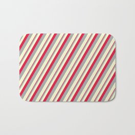 [ Thumbnail: Crimson, Dark Grey, and Light Yellow Colored Stripes Pattern Bath Mat ]