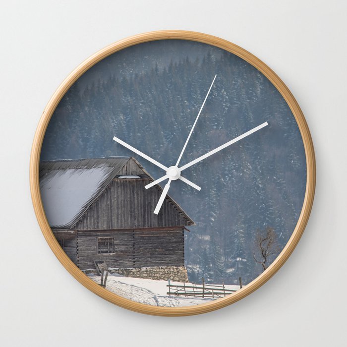 Winter landscape with an old house in a village Wall Clock