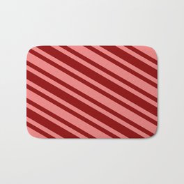 [ Thumbnail: Light Coral and Dark Red Colored Striped/Lined Pattern Bath Mat ]