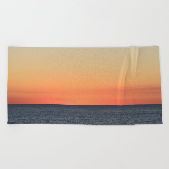 Setting Sun on the Open Sea Beach Towel