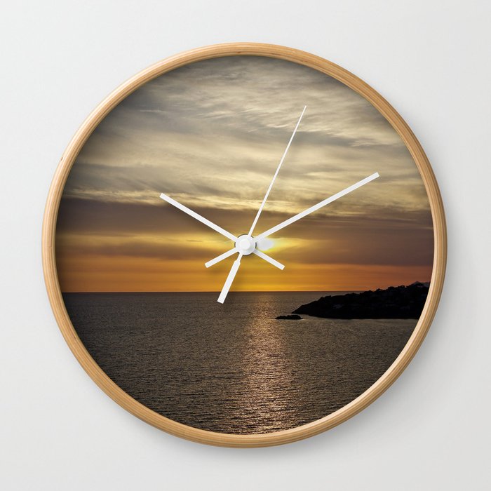 Sunset over the sea of Gaeta Wall Clock