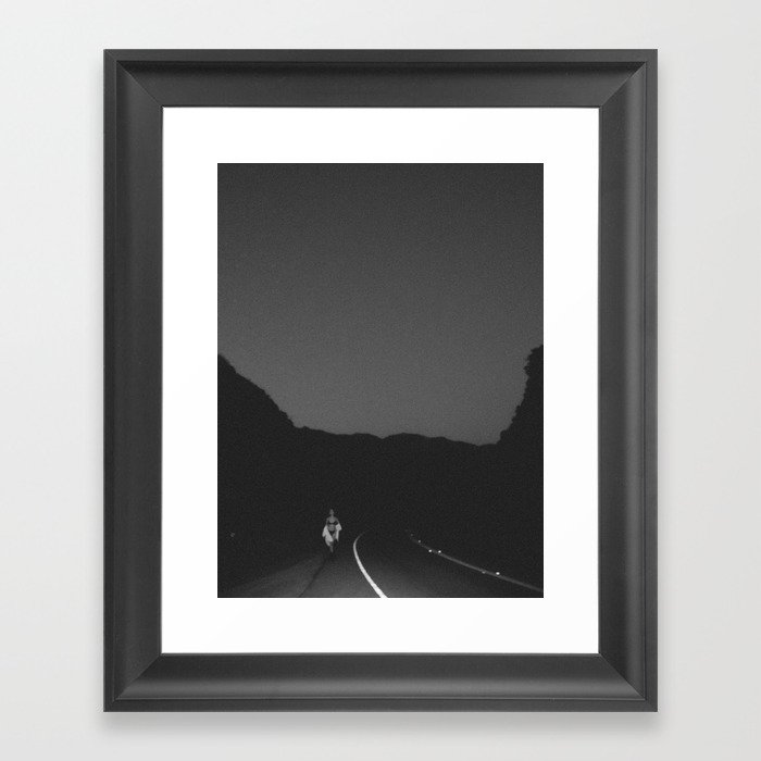 Woman in the road Framed Art Print