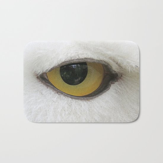 In the eye of a snow owl Bath Mat