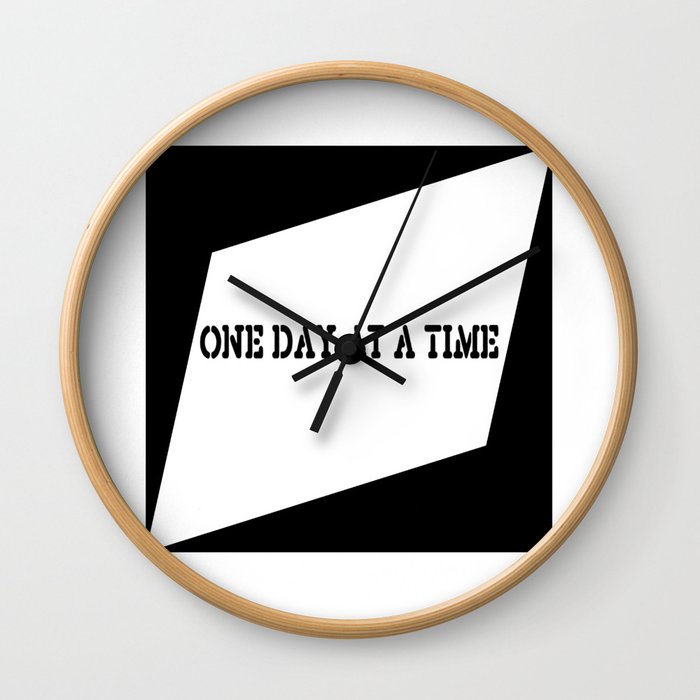 One Day at a Time (black) Wall Clock