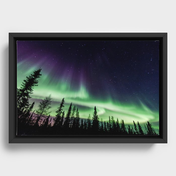 Aurora during geomagnetic storm in Yellowknife, Canada Framed Canvas