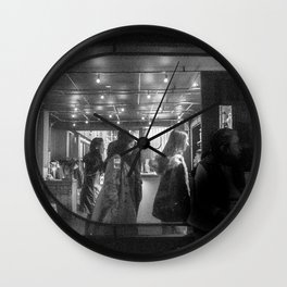 People getting out of a Place Wall Clock