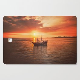 Ocean Sunset Pirate Ship Cutting Board