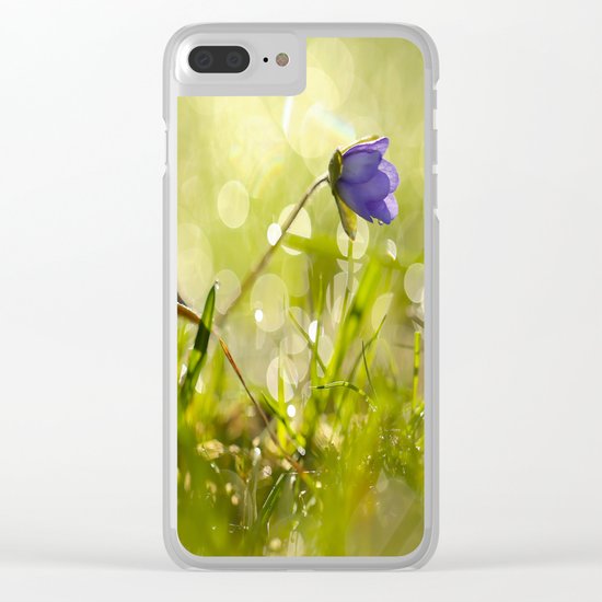 Beautiful spring - first flower little anemone with beautiful bokeh in green background Clear iPhone Case