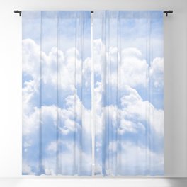 White Clouds in a Bright Blue Sky Blackout Curtain